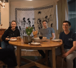 European volunteers Ana, Max and Johnannes enjoying a meal in the volunteer house