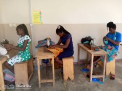 Girls train in tailoring with Street Girls Aid